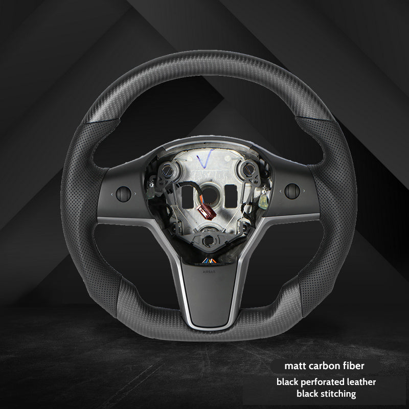 Matte carbon fiber steering wheel with perforated leather.